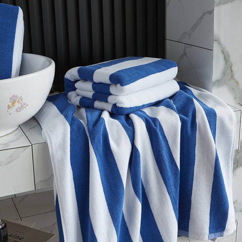 حوله استخر حوله ساحلی با نخ آبی رنگ سفید